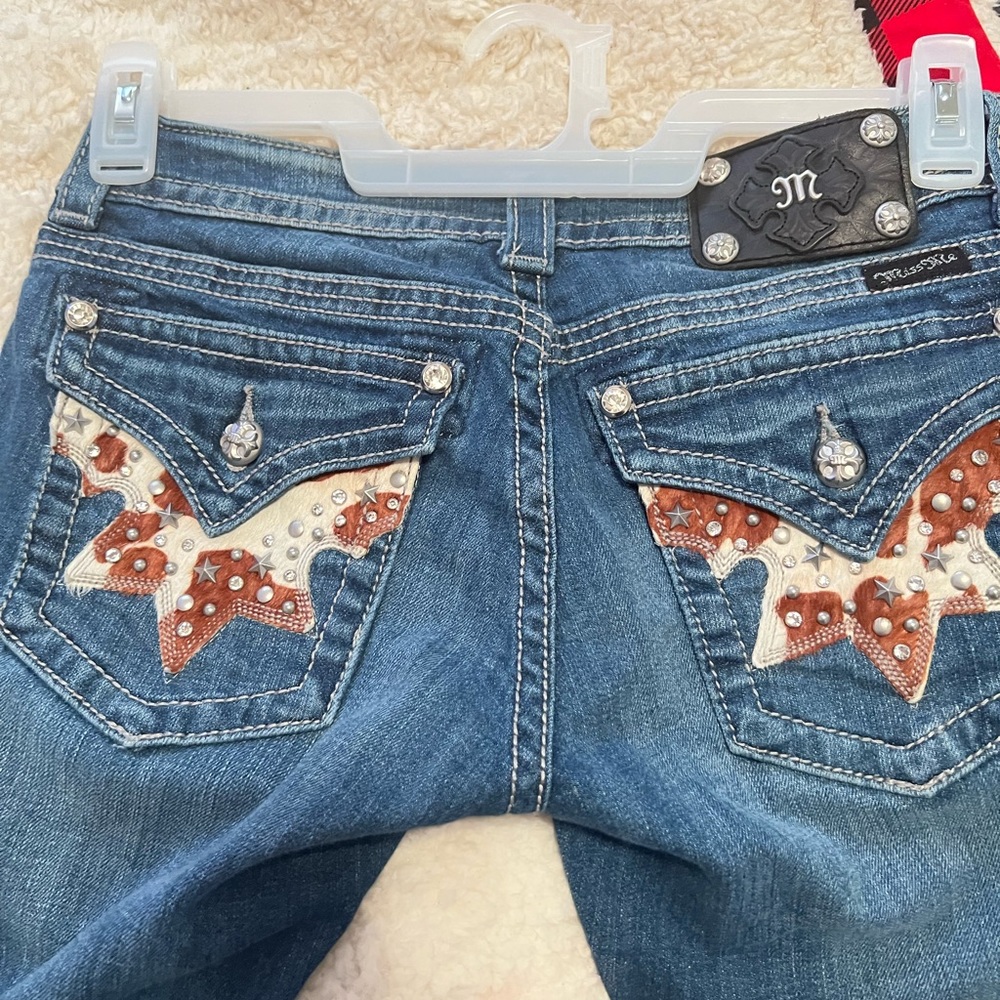 Miss Me 28 Boot Logo Buttons/Rhinestones Cowhide Back Pockets Jeans